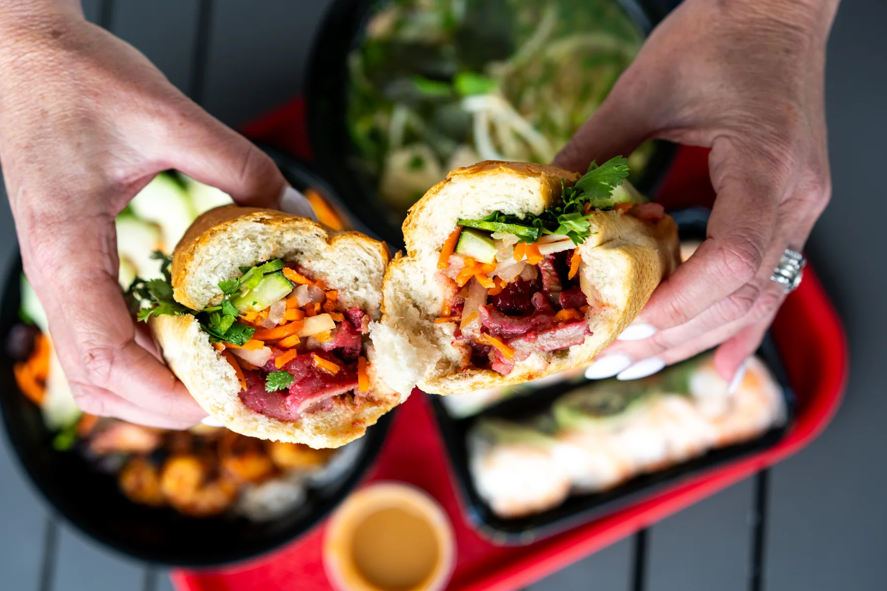 Freshly assembled bánh mì sandwich at Banh Mi Station